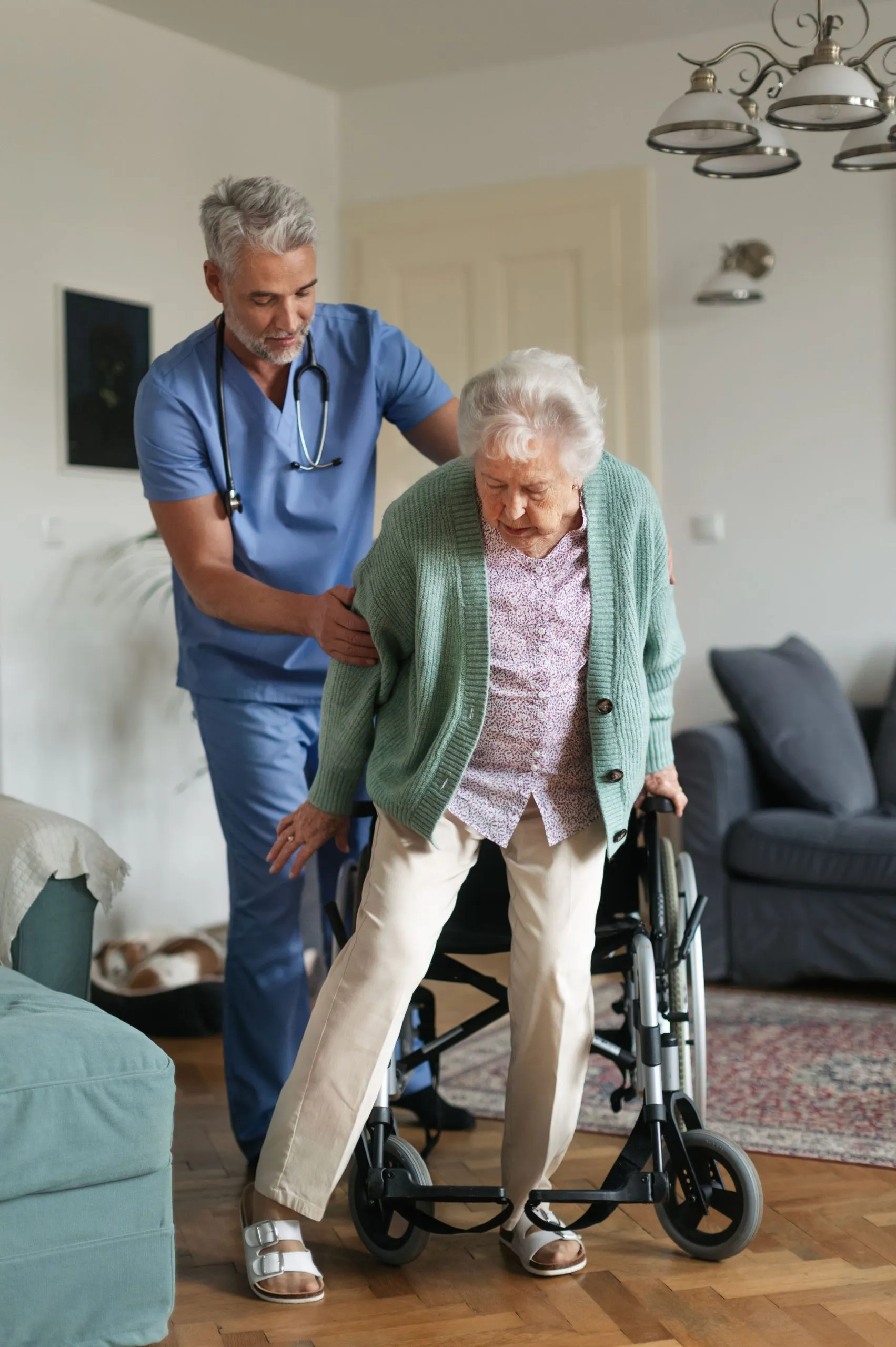 Caregiver helping elderly client